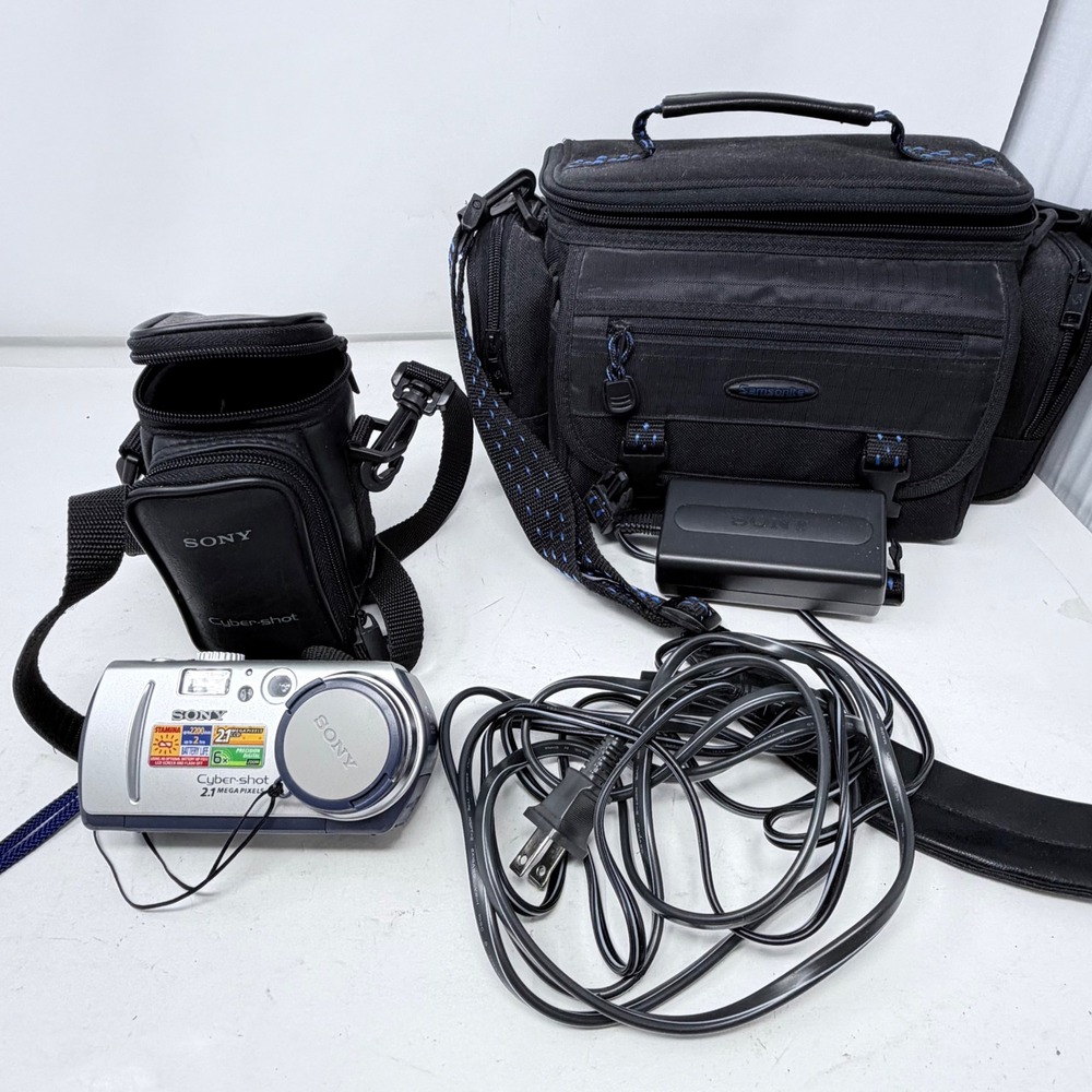 Sony Cyber-shot DSC-P50 2.1MP Digital Camera Silver Bundle Charger Manual Cases